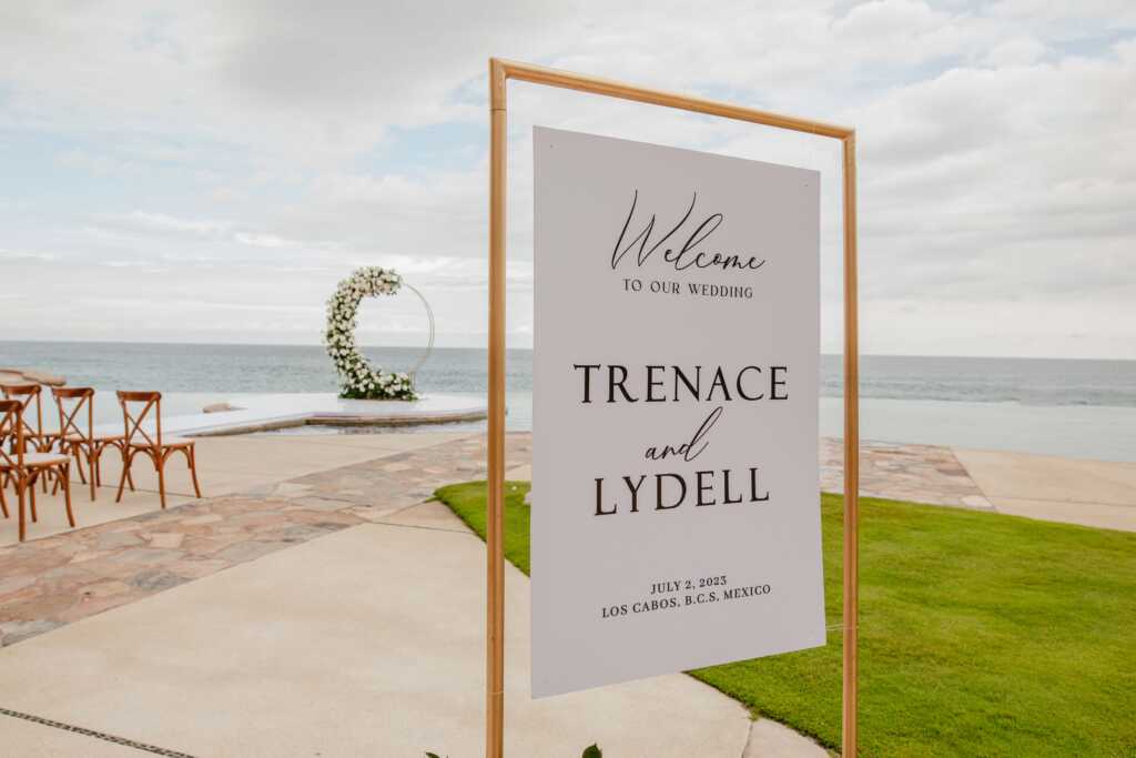 Stunning wedding ceremony photo at Waldorf Astoria Los Cabos Pedregal. Captured on a cliffside terrace with sweeping ocean views, this image showcases the elegance and romance of a destination wedding in Mexico. Perfectly timed with golden hour, the scene is beautifully illuminated, highlighting the natural beauty and luxurious setting of Waldorf Astoria Pedregal.