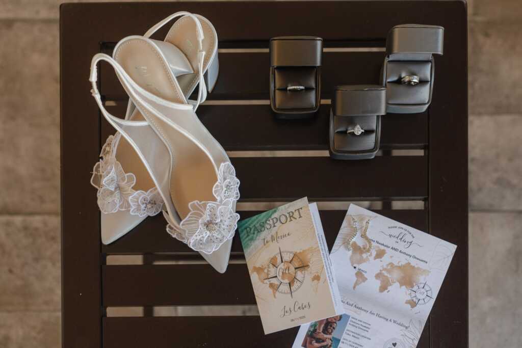 Wedding stationery with bridal shoes and rings Hacienda Encantada Los Cabos wedding