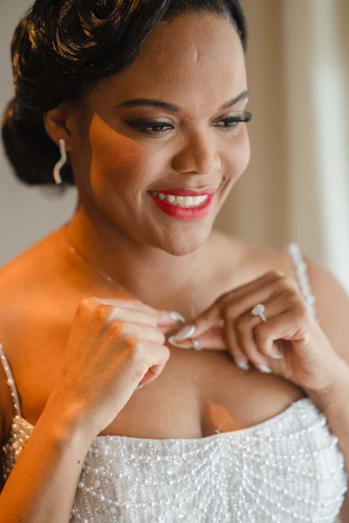 Bride adjusting necklace Hacienda Encantada Los Cabos wedding