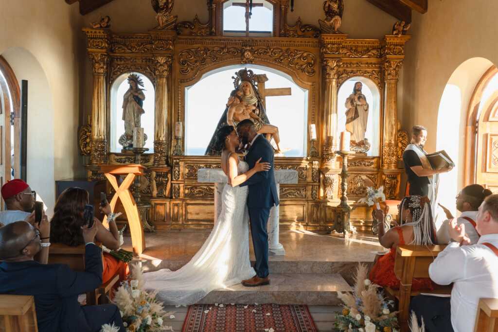 Wedding kiss bride and groom Hacienda Encantada Los Cabos Mexico