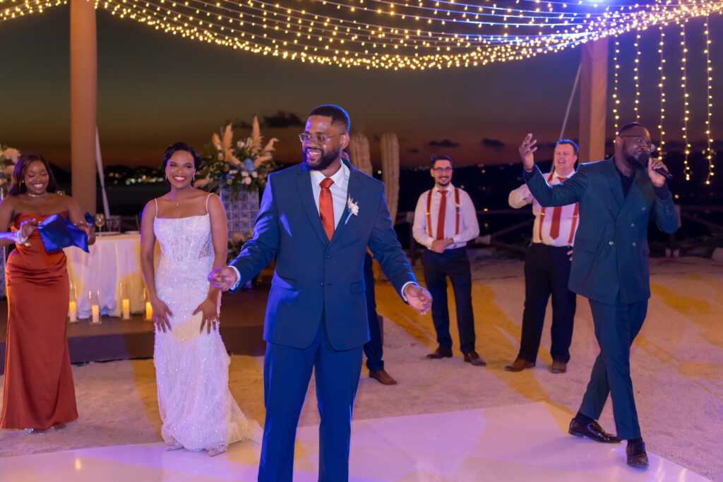 Newlyweds entering reception Hacienda Encantada Los Cabos wedding