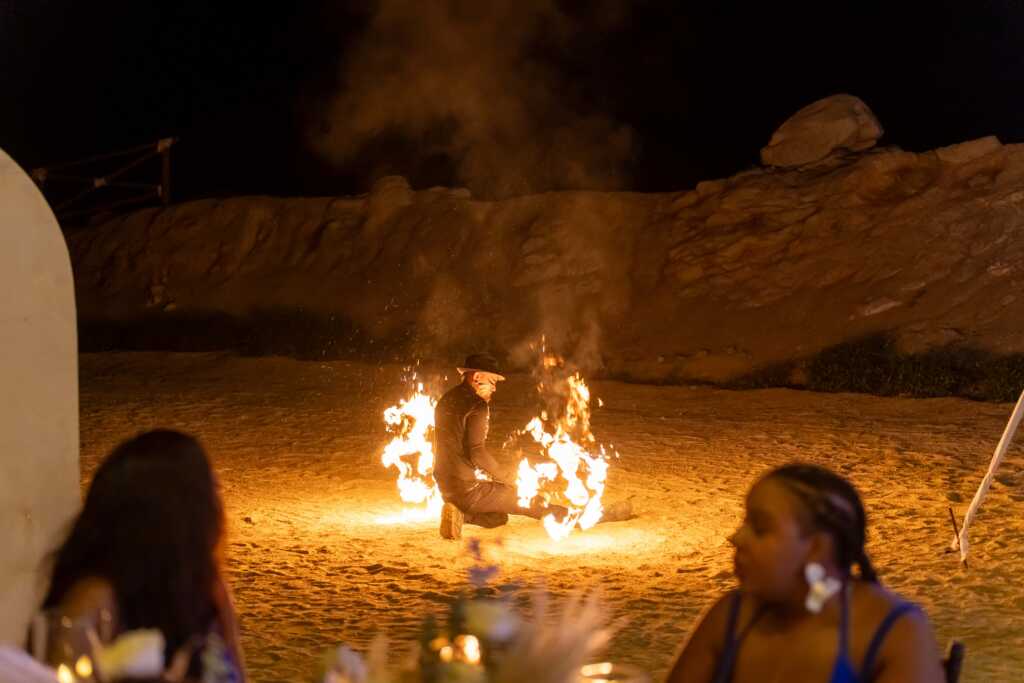 Fire dancer during wedding reception dinner Hacienda Encantada Los Cabos