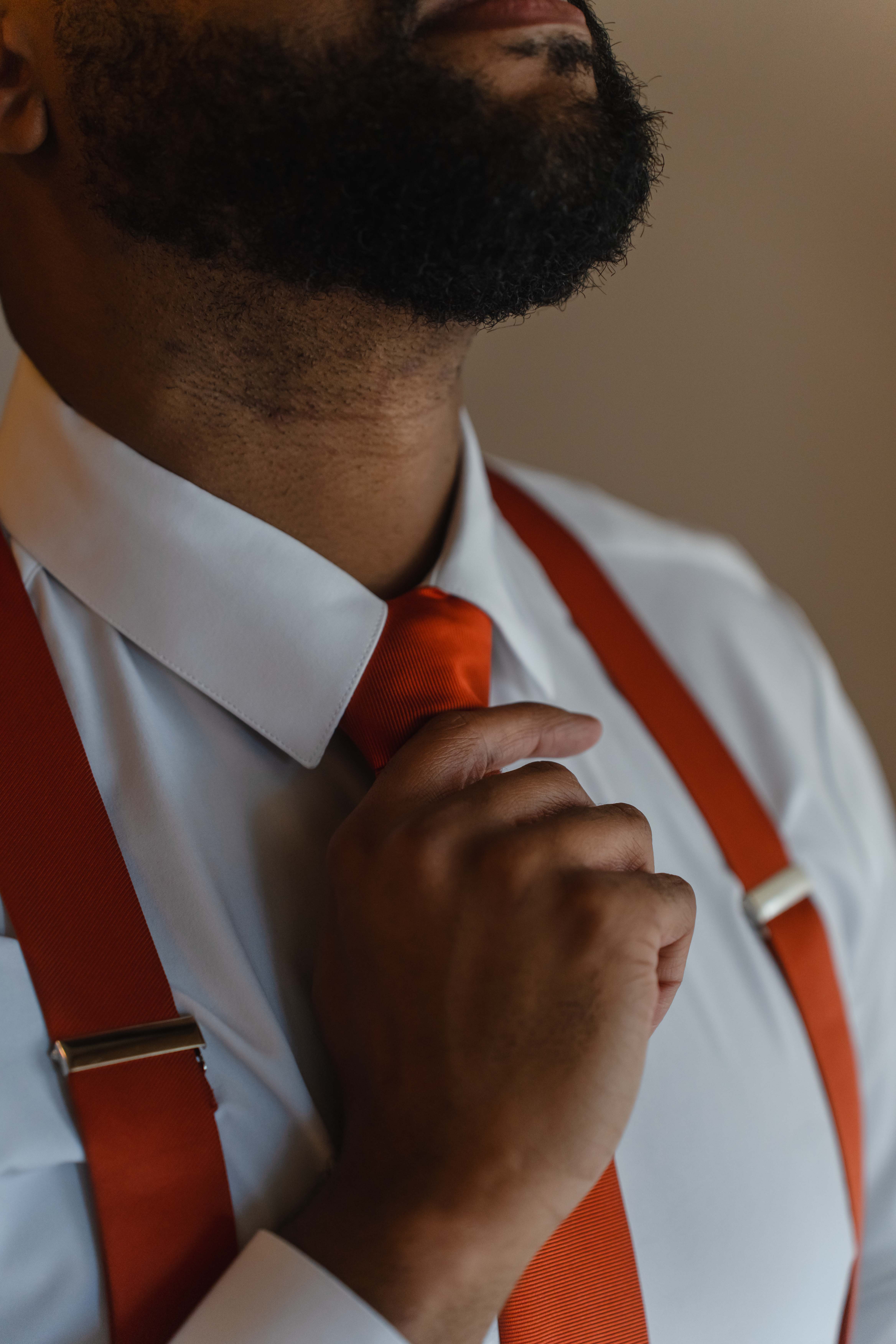 Wedding morning groom adjusting tie Hacienda Encantada Cabo Mexico