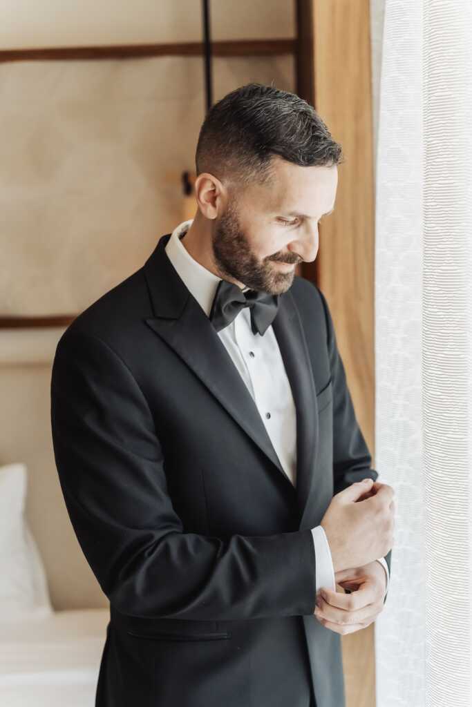 Groom getting ready at Nobu Hotel Los Cabos before his intimate destination wedding.