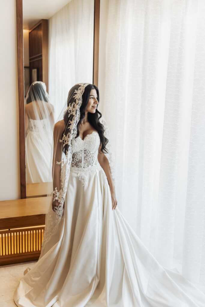 Bride ready in her wedding dress at Nobu Hotel Los Cabos before her intimate destination wedding.